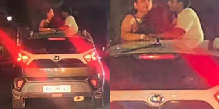 ಕಾರಿನ ಸನ್‌ರೂಫ್ ತೆಗೆದು ದಂಪತಿಯಿಂದ ಹುಚ್ಚಾಟ – ದಂಡ ವಿಧಿಸಿ, ಎಚ್ಚರಿಸಿದ ಪೊಲೀಸರು…!!!